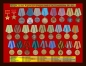 Планшет "Медали СССР" (52,0x40,0 см) с открывающейся крышкой. В комплекте - муляжи 28-ми наград, вручавшихся в период Великой Отечественной войны. Фотография №16