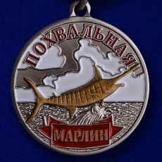 Лучшему рыбаку медаль "Марлин" фото